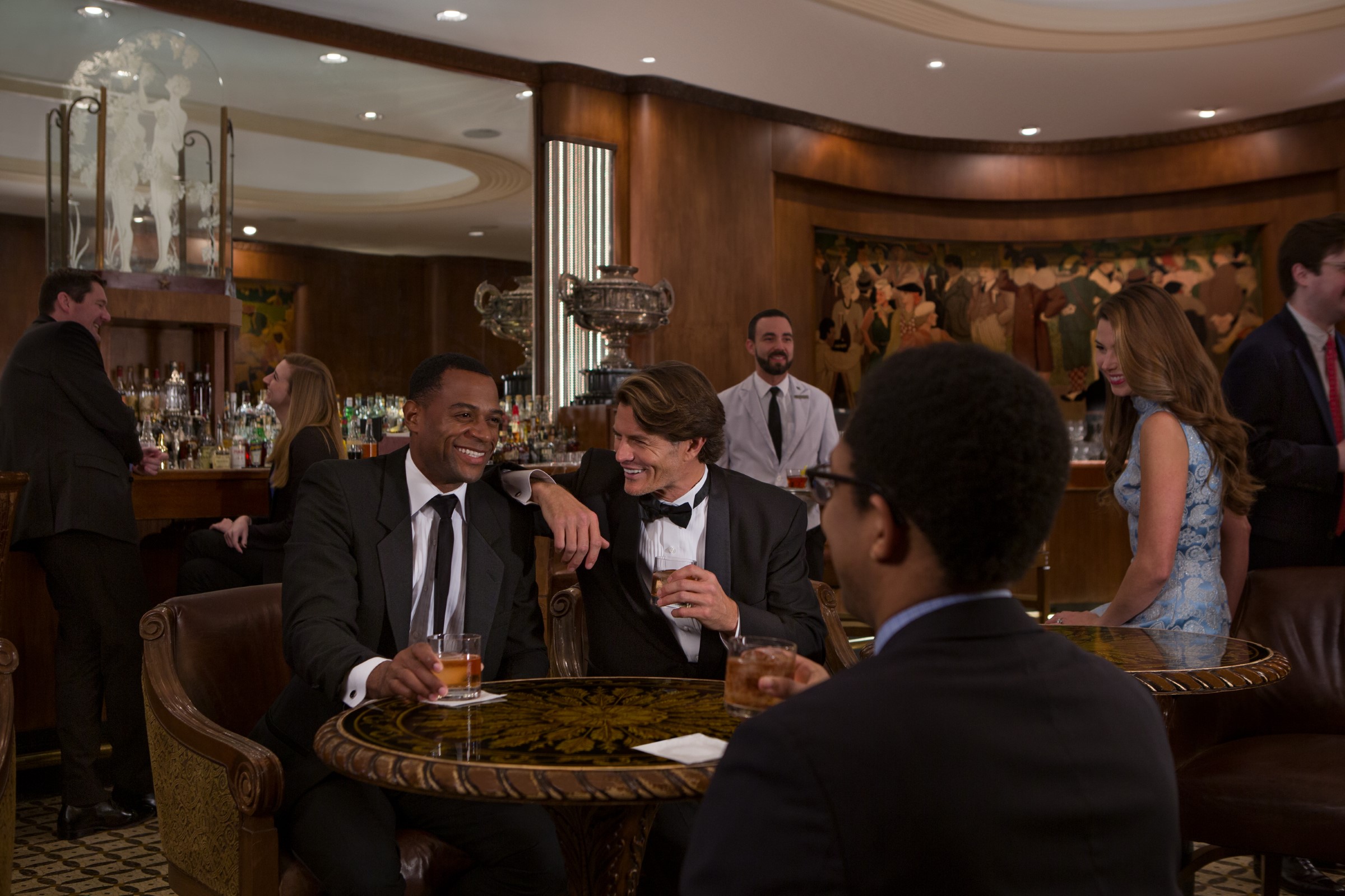 Friends Chatting And Getting Drinks At The Sazerac Bar