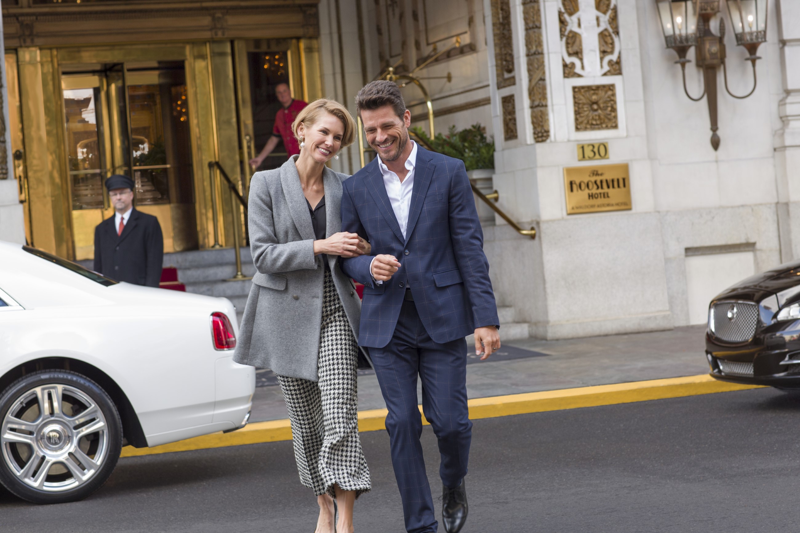 Close Up Of A Couple Walking Out Of The Roosevelt