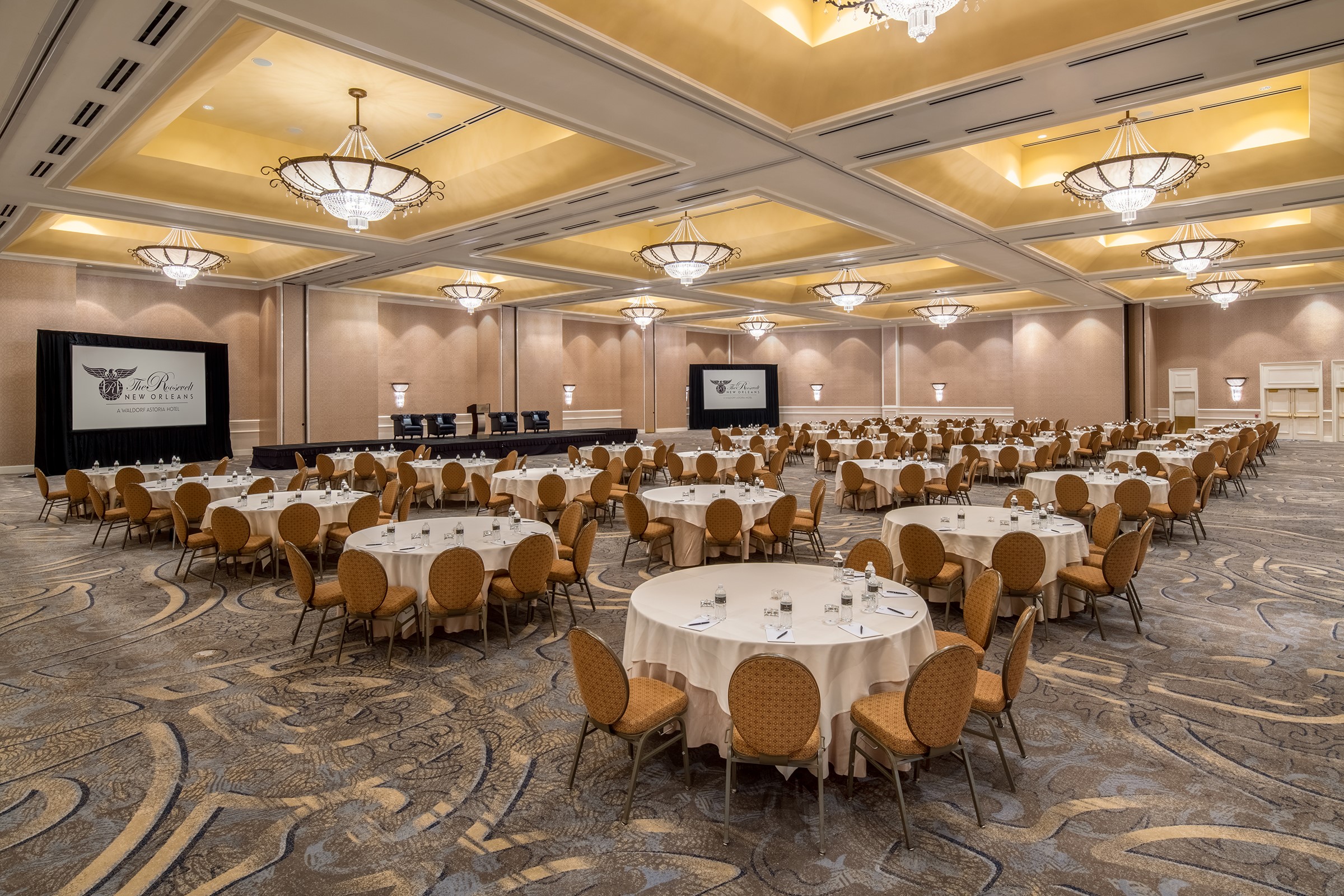 Crecent Ballroom Set Up For A Conference With Circular Tables